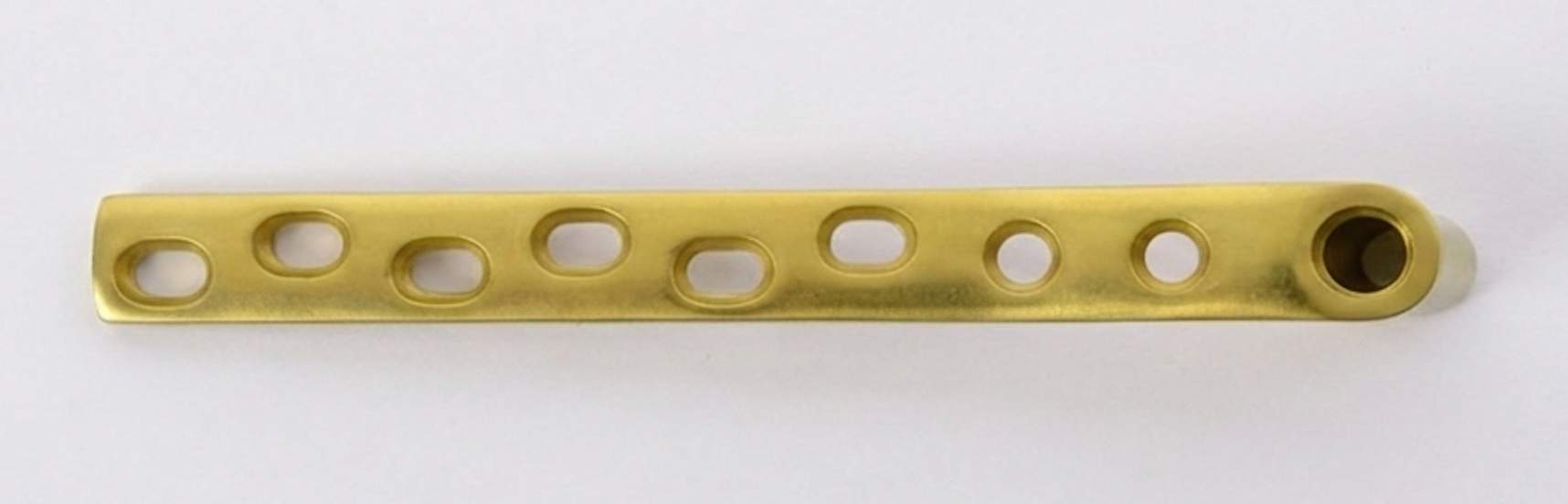 Snow-capped mountains at sunrise reflected in a lake