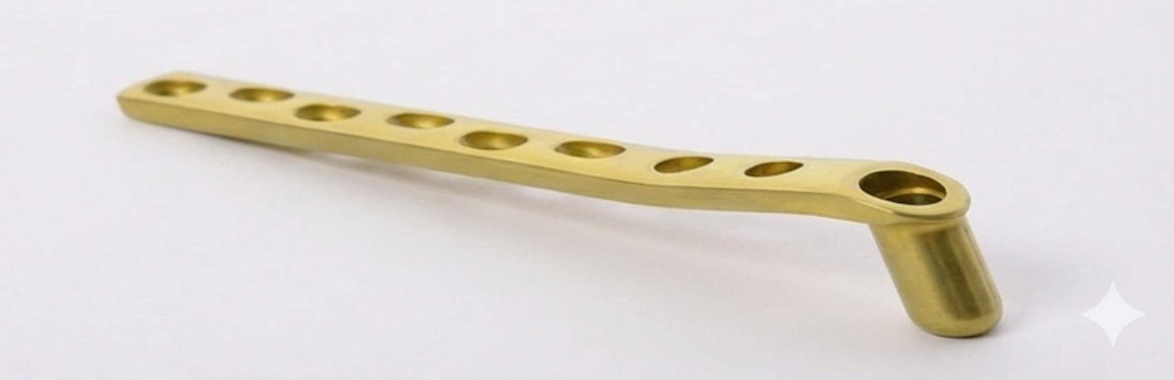 Turquoise waves hitting a rocky coastline at sunset