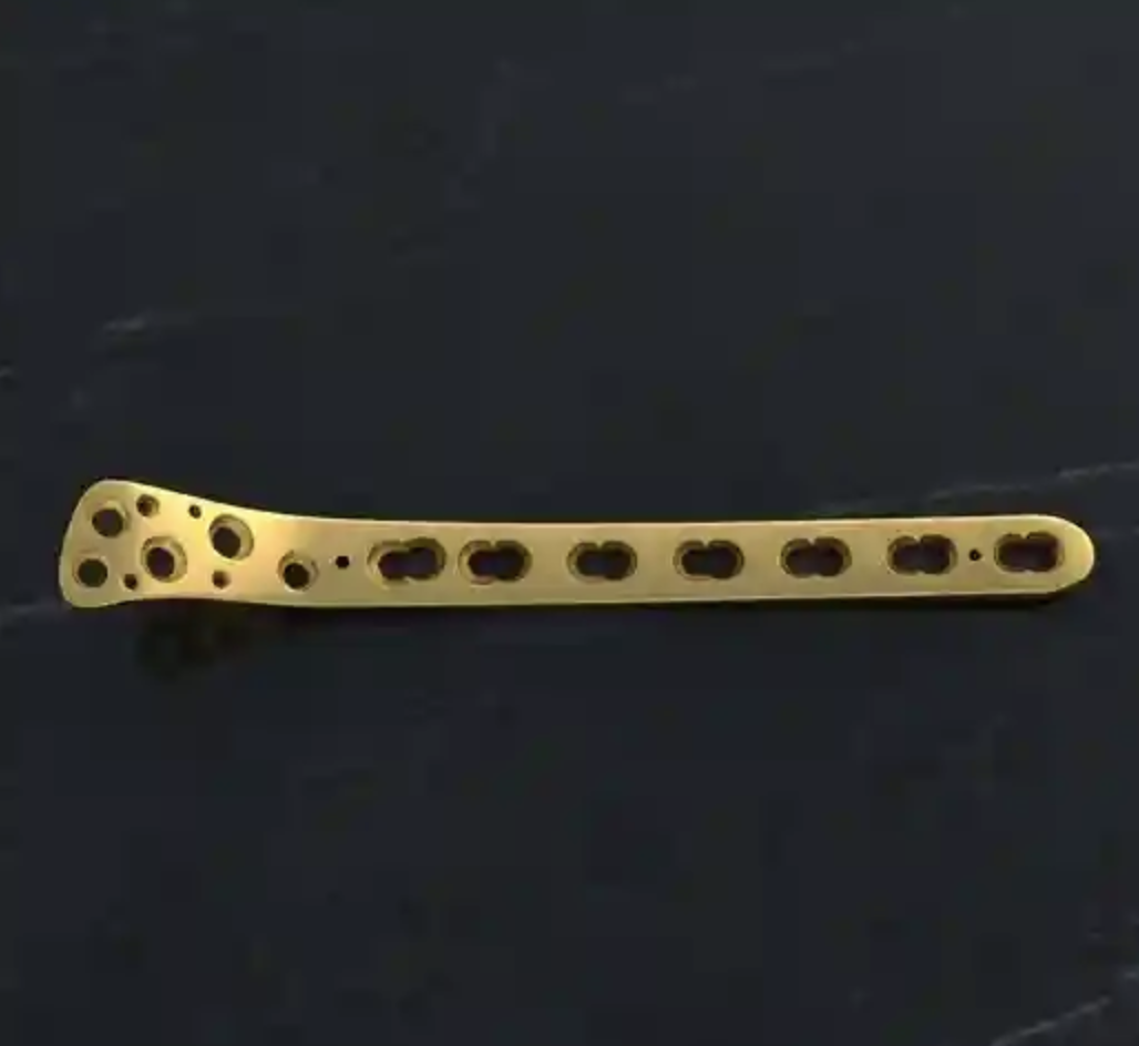 Snow-capped mountains at sunrise reflected in a lake